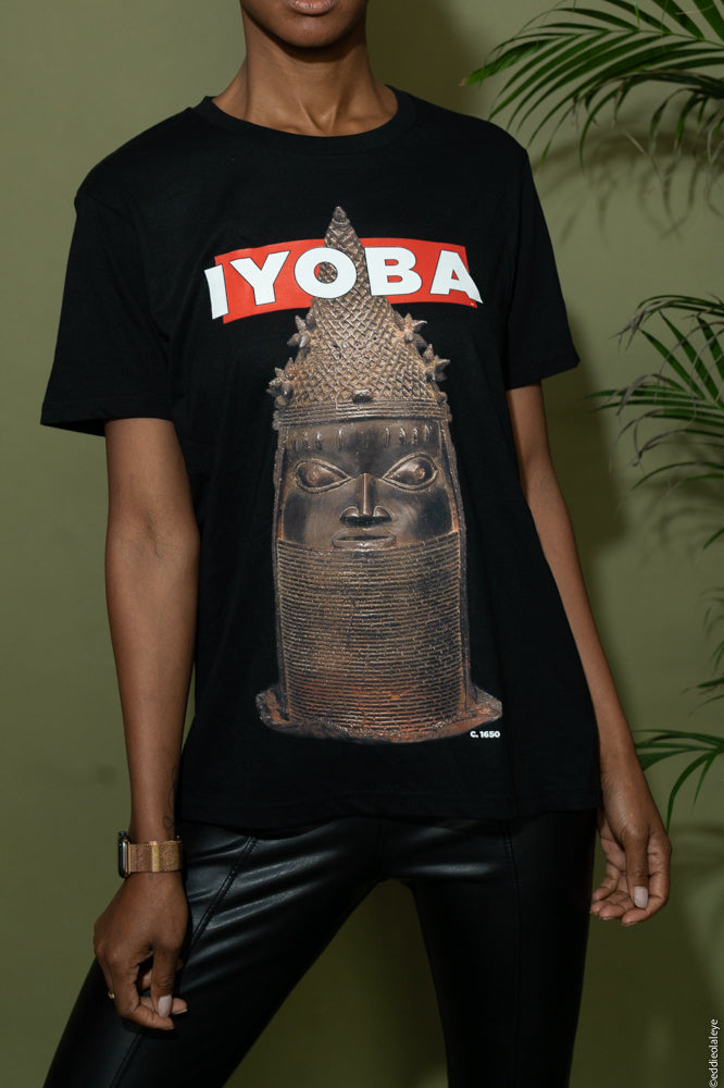 A solid bronze stolen artefact, known as "Iyoba" - Mother of the King, is depicted on this black, organic cotton t-shirt