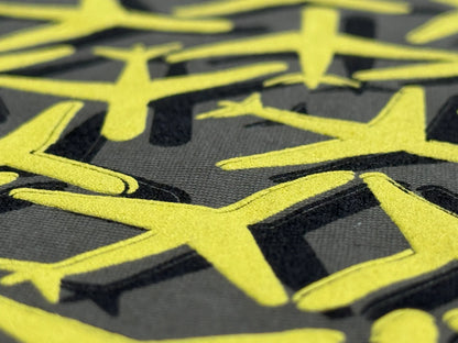Close-up of yellow and black geometric patterned fabric